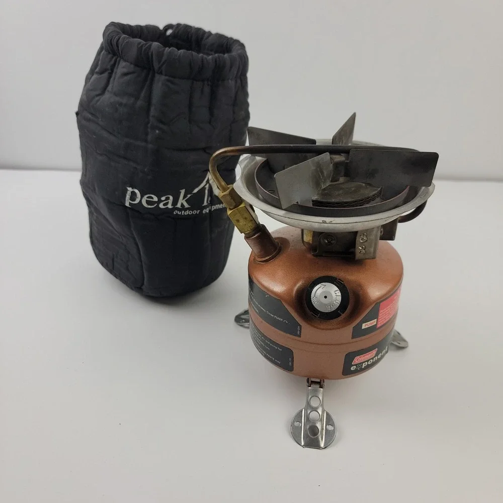 Coleman Exponent Feather 442 Dual Fuel Stove Copper with Peak 1 Case USA